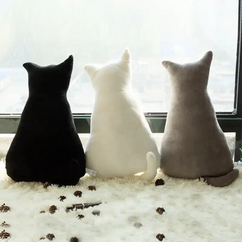Decorative cat pillows in black whte gray