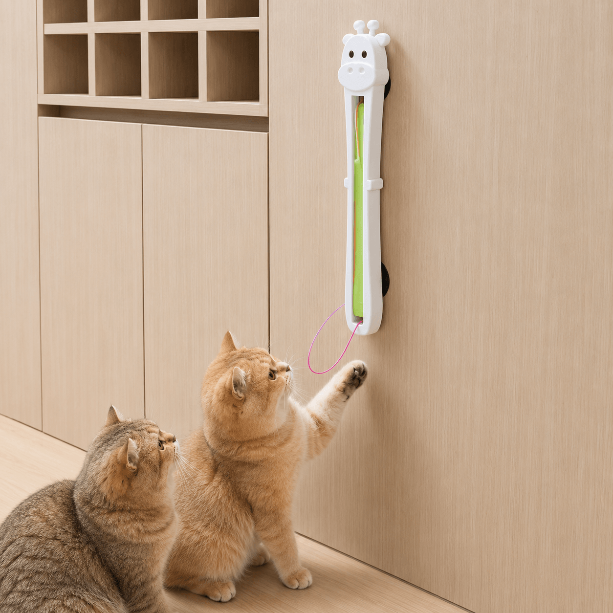 Side view of the automatic Moving String Interactive Cat Toy with a continuously moving string.