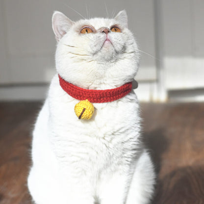 Cat wearing crochet knitting bell cat collar