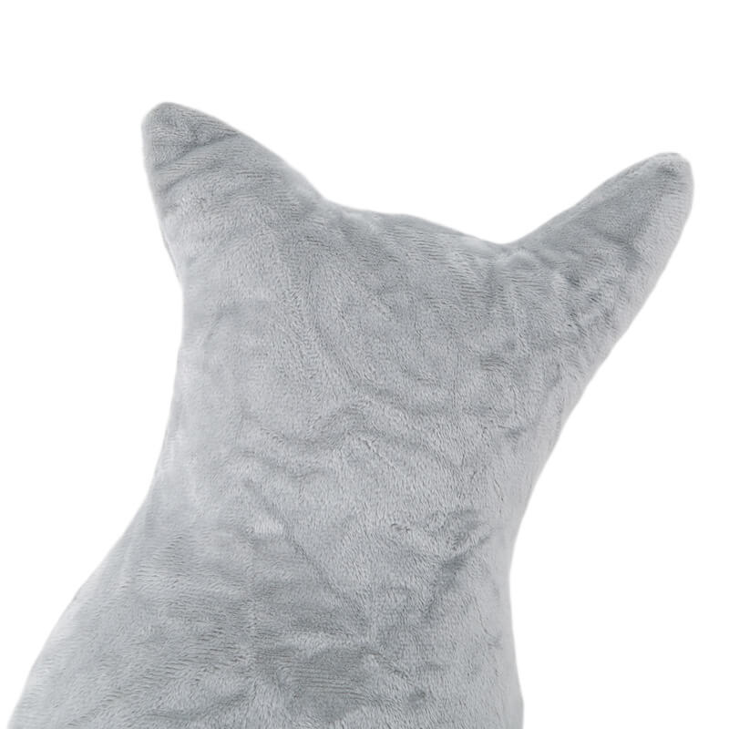 close up of gray decorative cat pillow