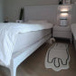 Cute White Cat Belly Bedside Rug in Bedroom